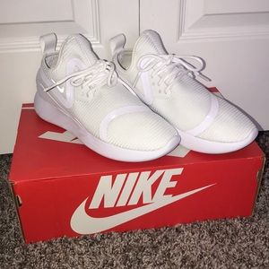 White Nike Running Shoes.